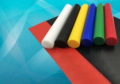 Different types of plastic rods stacked together showing material options and durability